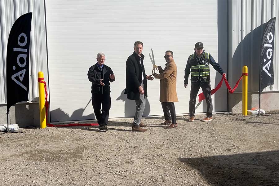 Aalo Atomics CEO Matt Loszak, second from left, and the rest of the executive team immediately after cutting the ribbon on the reactor. | Rett Nelson, EastIdahoNews.com