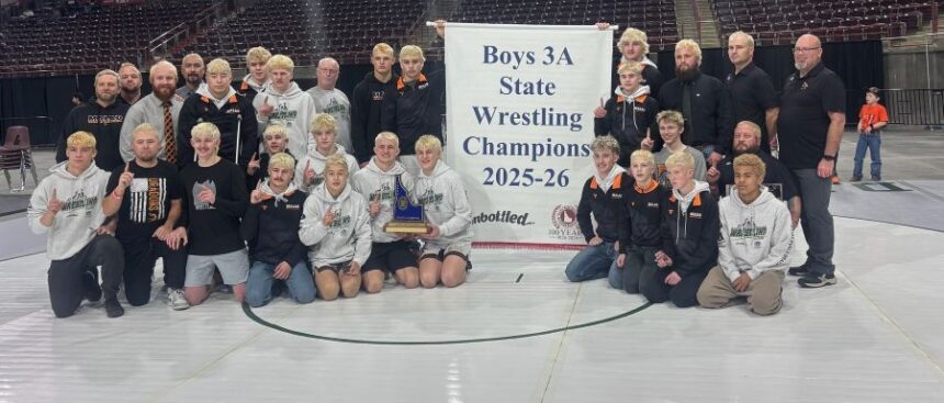 The Malad boys wrestling team celebrates a third state title. | Courtesy photo.