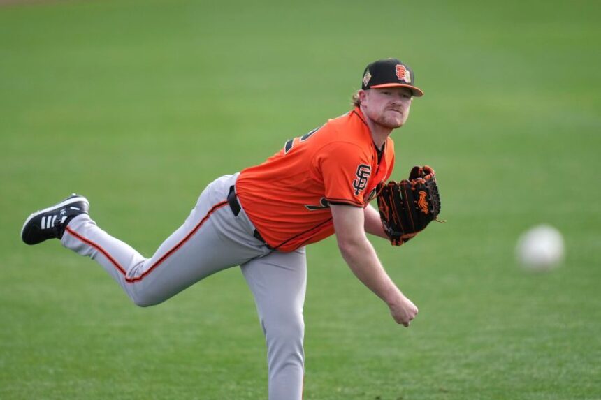 San Francisco Giants pitcher Logan Webb works out during spring training baseball Wednesday, Feb. 11, 2026, in Scottsdale, Ariz. (AP Photo/Ross D. Franklin)