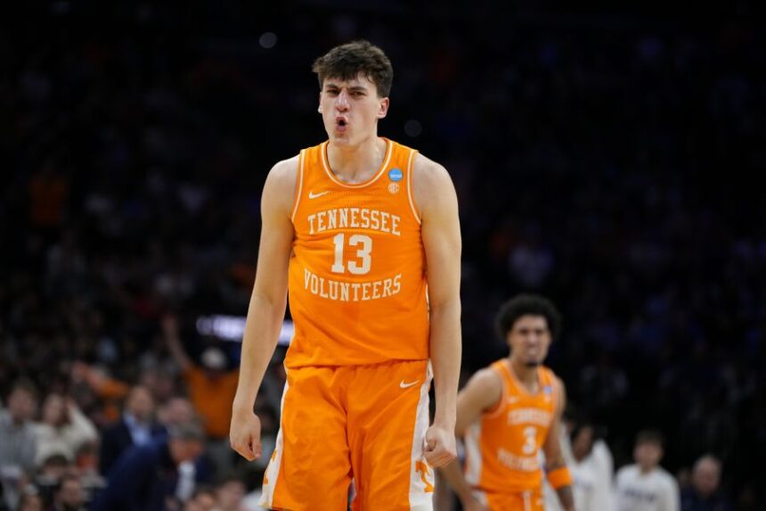 Tennessee's J.P. Estrella reacts after a basket during the second half against Virginia in the second round of the NCAA college basketball tournament, Sunday, March 22, 2026, in Philadelphia. (AP Photo/Matt Slocum)