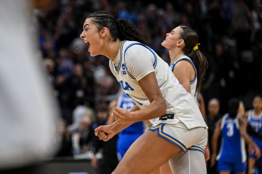 UCLA center Lauren Betts (51) rects after defeating Duke in the Elite Eight of the NCAA college basketball tournament Sunday, March 29, 2026, in Sacramento, Calif. (AP Photo/Justine Willard)