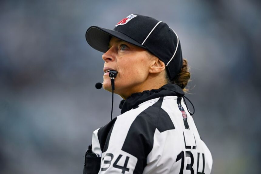 FILE - Line judge Robin DeLorenzo looks on during the second half of an NFL football game between the Jacksonville Jaguars and the Tennessee Titans, Dec. 29, 2024, in Jacksonville, Fla. (AP Photo/Phelan M. Ebenhack, File)