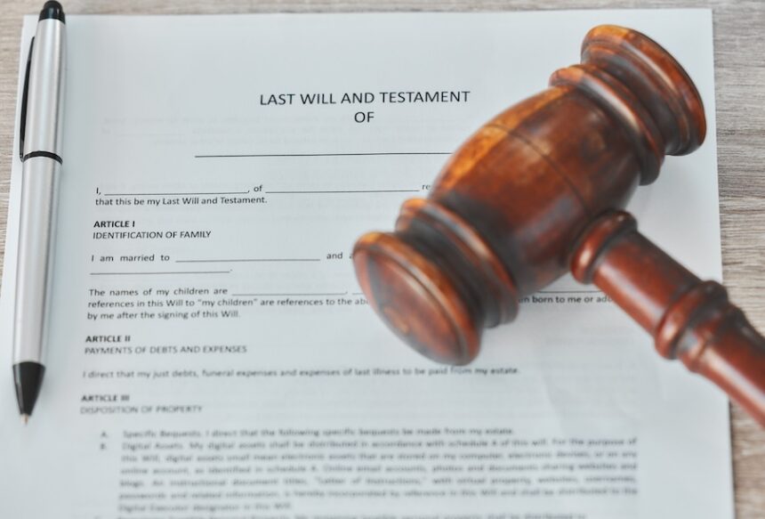 Pen, last will and testament with contract, gavel and legal aid with law and document on a desk. Pa.