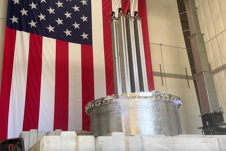 Aalo Atomics' nuclear sat below a 50-foot by 30-foot American flag during Thursday's unveiling, a fitting symbol for the Trump Administration's push to win the global nuclear and AI race. | Rett Nelson, EastIdahoNews.com