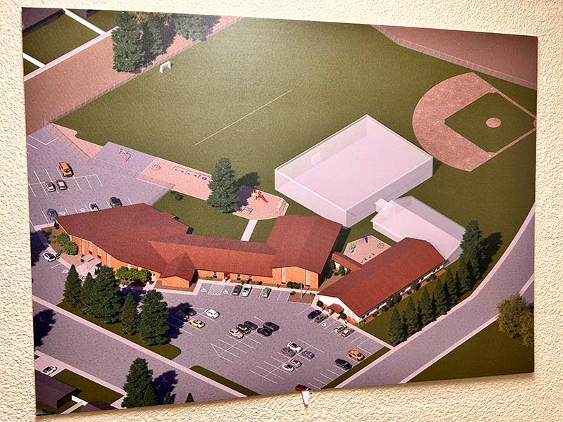 Rendering of the new school building on display inside Hope Lutheran. | Rett Nelson, EastIdahoNews.com