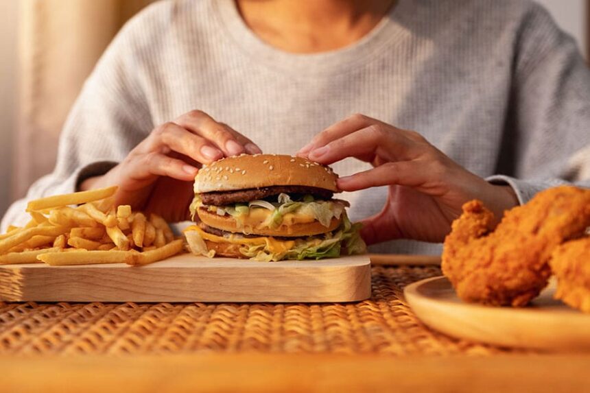 woman eating junk food
