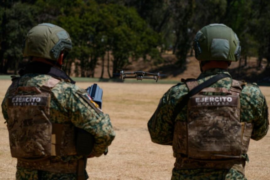 Soldiers from the Mexican Army's anti-drone squadron display the equipment and tactics they will use during the 2026 FIFA World Cup, during a media presentation in Mexico City, Friday, Feb. 27, 2026. (AP Photo/Marco Ugarte)