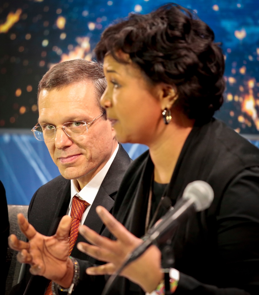 FILE - Harvard physicist Avi Loeb, left, listens as former NASA astronaut Dr. Mae C. Jemison, speaks during a press conference in New York on April 12, 2016.