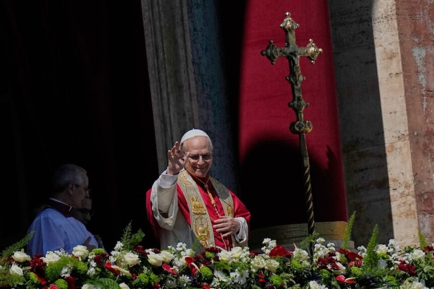 Pope Leo XIV addresses the faithful after delivering the Urbi et Orbi blessing - Latin for "to the city of Rome and to the world" - from the central loggia of St. Peter's Basilica at the end of Easter Mass he presided over in St. Peter's Square at the Vatican, Sunday, April 5, 2026. (AP Photo/Alessandra Tarantino)