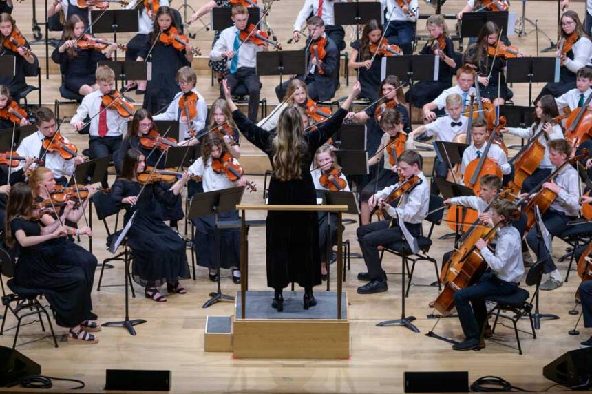The Madison Junior High School student orchestra performs at the Lincoln Center for the Performing Arts on Sunday, April 12, 2026.