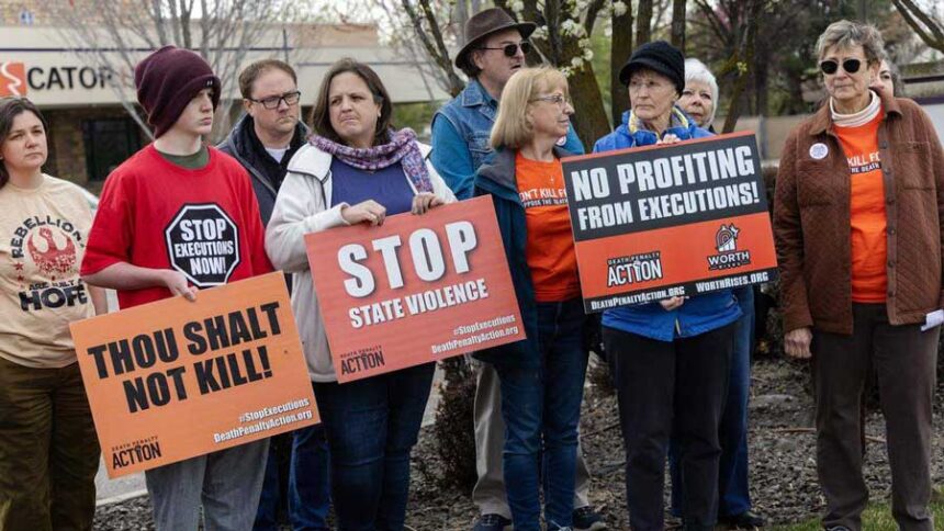 People demonstrate against the death penalty outside of Cator Ruma and Associates in March 2026 in Boise. Cator Ruma and Associates is a local engineering firm contracted to design Idaho's new firing squad execution chamber.