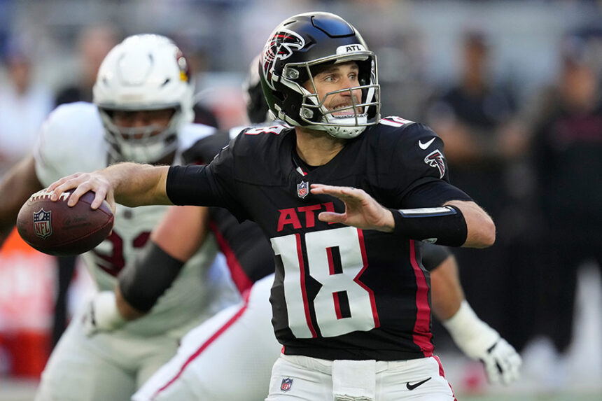 Atlanta Falcons quarterback Kirk Cousins throws against the Arizona Cardinals during the first half of an NFL football game, Dec. 21, 2025, in Glendale, Ariz. (AP Photo/Ross D. Franklin, File)