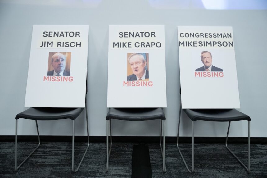 Empty chairs sit out for Sens. Mike Crapo and Jim Risch, along with House Rep. Mike Simpson, during a town hall they declined to attend in Pocatello on Friday, April 3.