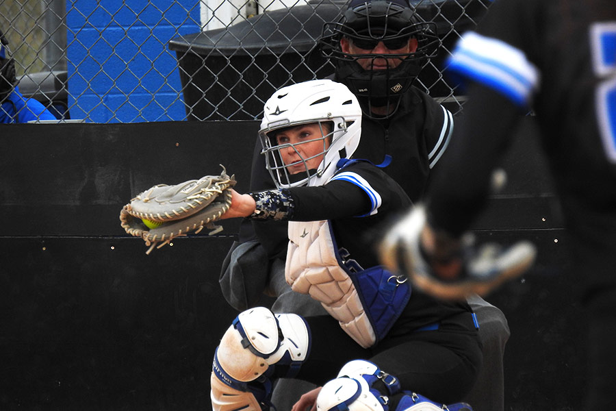 Bear Laker Kambria Romrell receives a pitcher from her sister Brielle Romrell