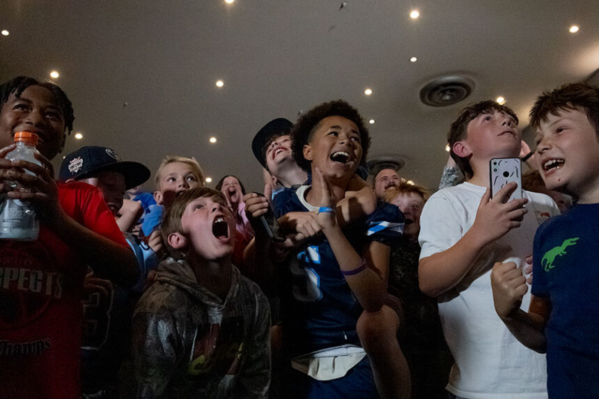 Dozens of local children celebrating as former Skyline High School football player Kenyon Sadiq was annoucned to play for the New York Jets. | Daniel V. Ramirez, EastIdahoNews.com