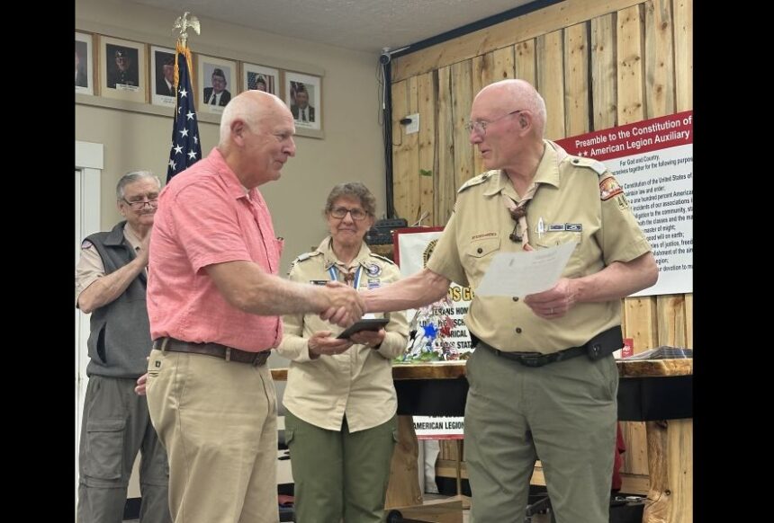 Former Blackfoot Mayor Paul Loomis accepts the Pillar of the Community award from Scouting America's Twin Buttes District on Friday, April 24, 2026.