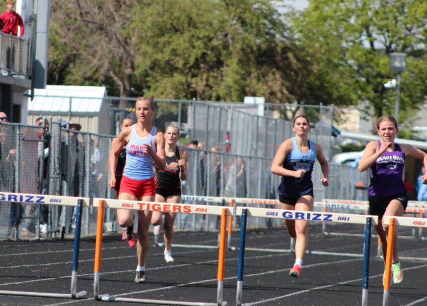 Marsh Valley's Lydia Townsend out in front of the 100 hurdles race Saturday at Tiger-Grizz. | Allan Steele, EastIdahoSports.com.