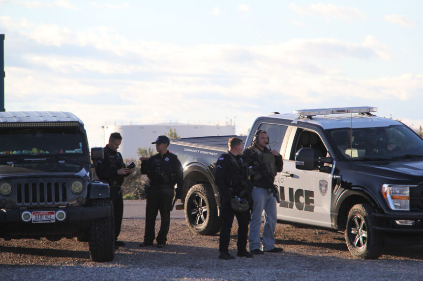 Officers return from the scene at around 7 p.m.