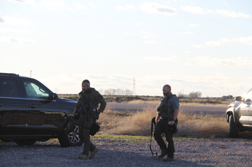 Officers return from the scene at around 7 p.m.