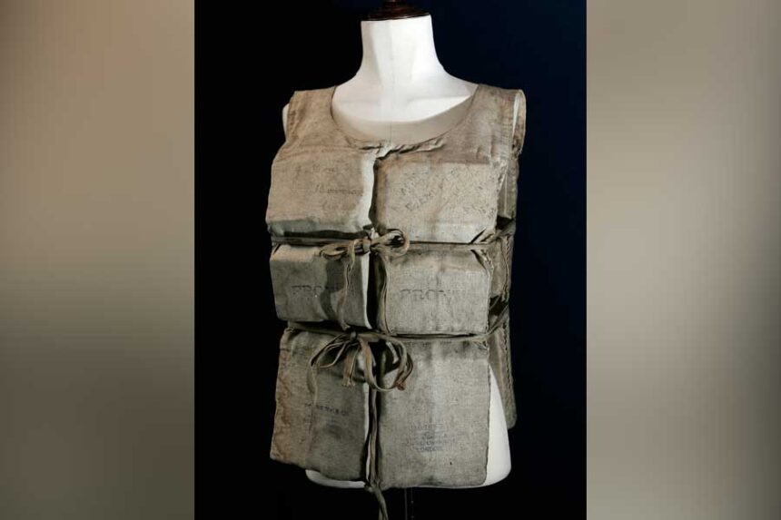 A life preserver worn by an RMS Titanic survivor as she escaped the sinking steamship on a lifeboat is shown in London, May 16, 2007. The life jacket sold at auction on Saturday for 670,00 pounds, or $906,108 in U.S. dollars.
