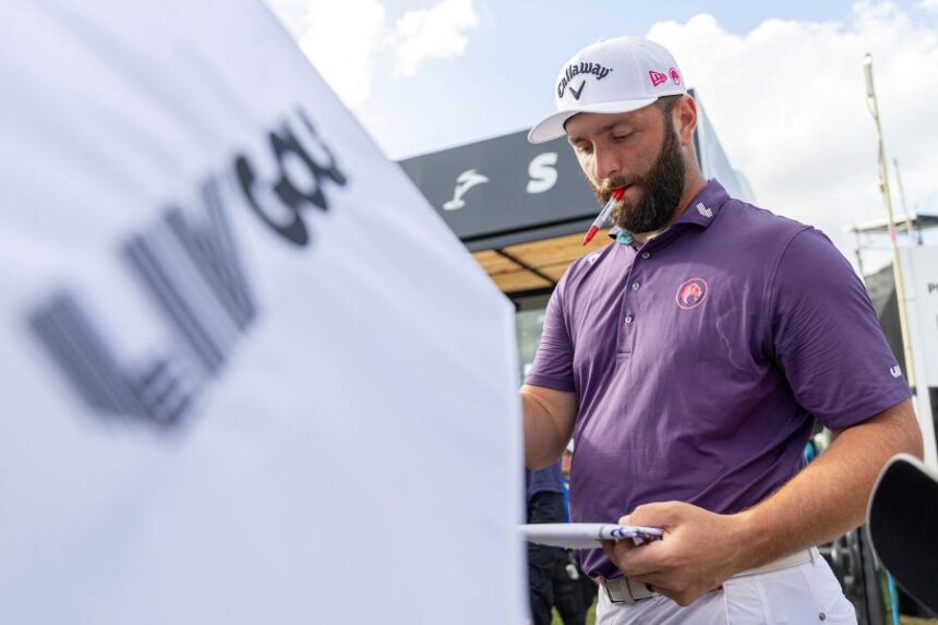 FILE - Captain Jon Rahm of Legion XIII signs autographs after the first round of LIV Golf tournament at Trump National Doral, April 4, 2025 in Miami. (Photo by Scott Taetsch/LIV Golf via AP, File)