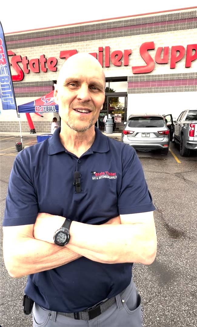 Recent photo of Mark Hult in front of a Utah store. | Courtesy Larry Rogers