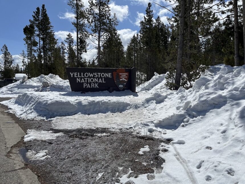 A deep snowpack blankets Yellowstone National Park’s West Entrance at West Yellowstone, Mont. in this file photo from April 2023.