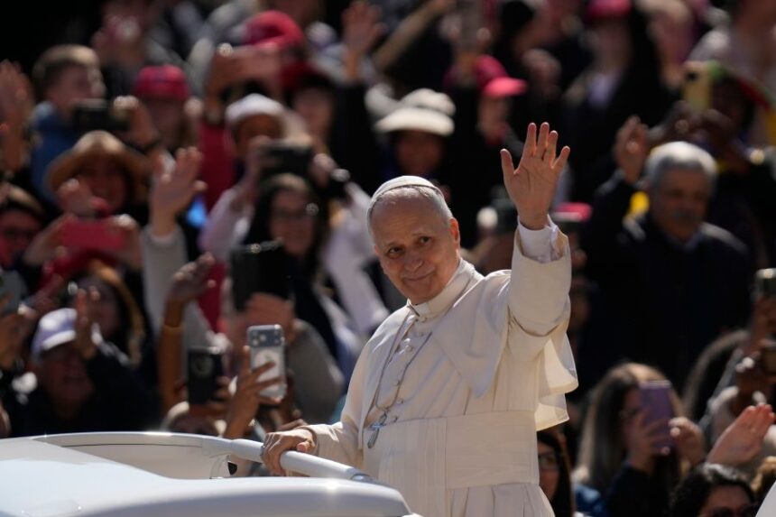 Pope Leo XIV arrives for his weekly general audience in St. Peter's Square, at the Vatican, Wednesday, April 8, 2026. (AP Photo/Gregorio Borgia)