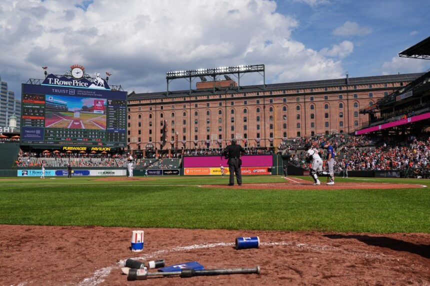 A called ball is overturned through the Automated Ball-Strike system, resulting in a win for the Baltimore Orioles over the Texas Rangers in the ninth inning of a baseball game, Wednesday, April 1, 2026, in Baltimore. (AP Photo/Stephanie Scarbrough)
