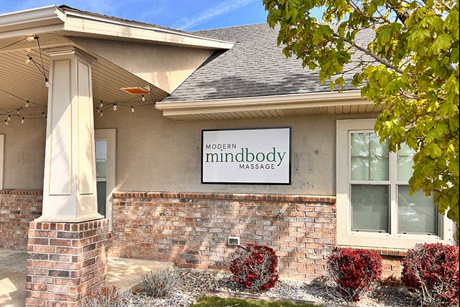Sign on storefront of Modern Mindbody Massage in Ammon. | Rett Nelson, EastIdahoNews.com