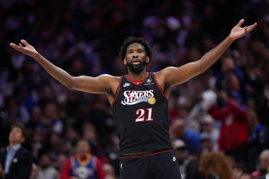 Philadelphia 76ers' Joel Embiid reacts during the first half of Game 4 against the Boston Celtics in a first-round NBA basketball playoffs series Sunday, April 26, 2026, in Philadelphia. (AP Photo/Matt Slocum)