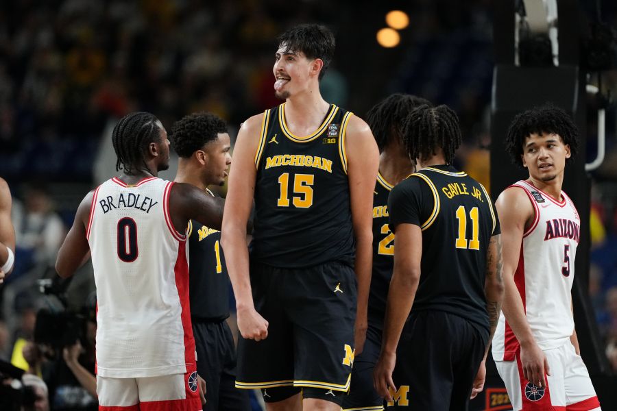 In NCAA title game, a Michigan team on a roll tries to derail a UConn dynasty