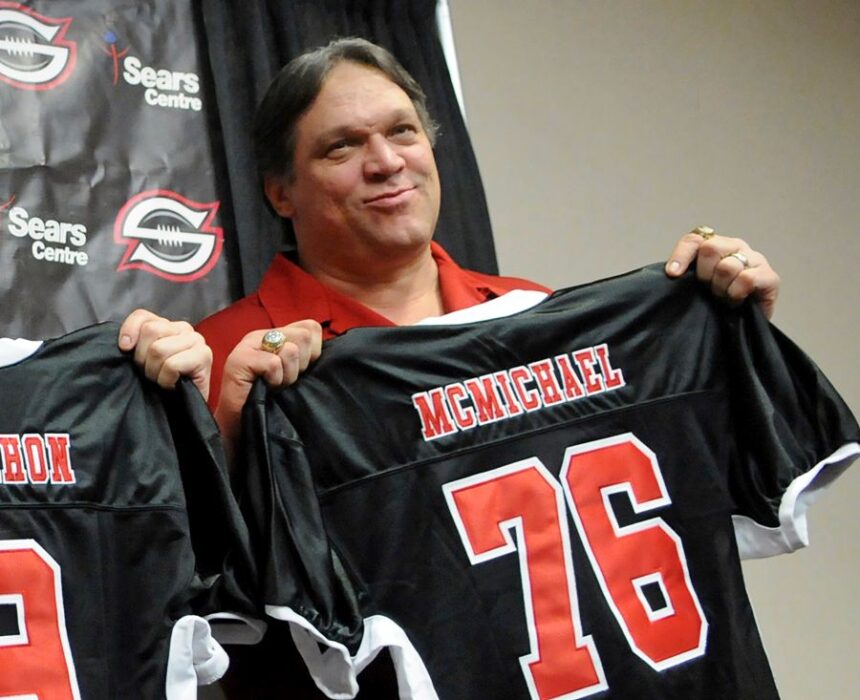 FILE - Former Chicago Bears defensive tackle Steve McMichael holds a Chicago Slaughter jersey during a news conference Feb. 19, 2010, in Chicago. (John J. Kim/Chicago Sun-Times via AP, File)