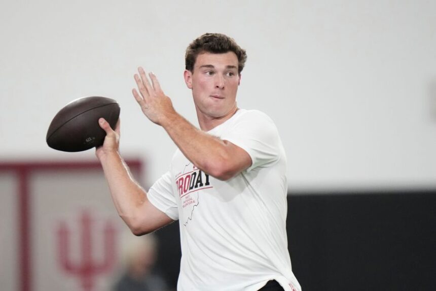 Indiana quarterback Fernando Mendoza looks to throw a pass during the school's NFL football pro day Wednesday, April 1, 2026, in Bloomington, Ind. (AP Photo/AJ Mast)