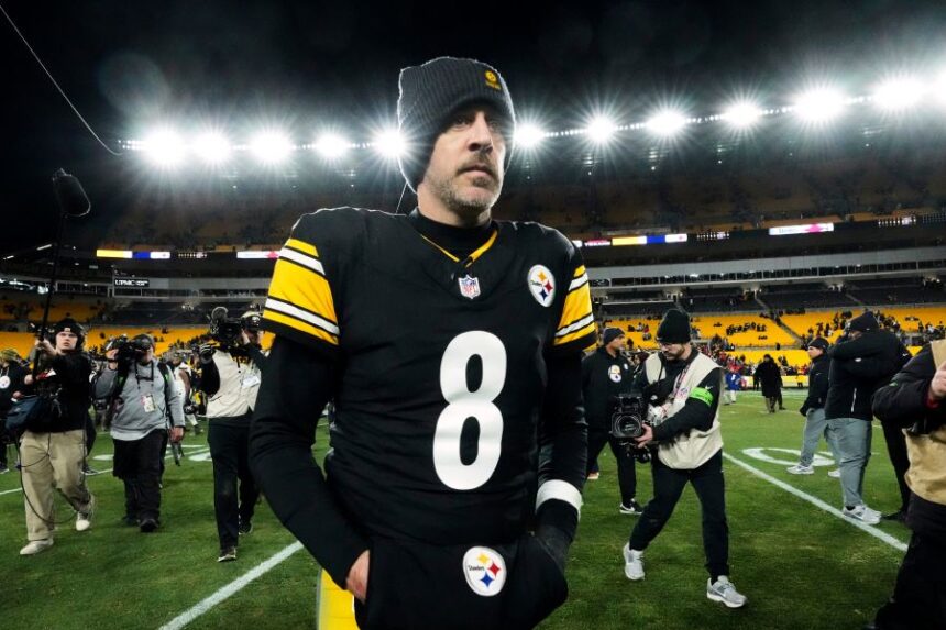 FILE - Pittsburgh Steelers quarterback Aaron Rodgers (8) leaves the field after an NFL wild-card playoff football game against the Houston Texans, Monday, Jan. 12, 2026, in Pittsburgh. (AP Photo/Gene J. Puskar,File)