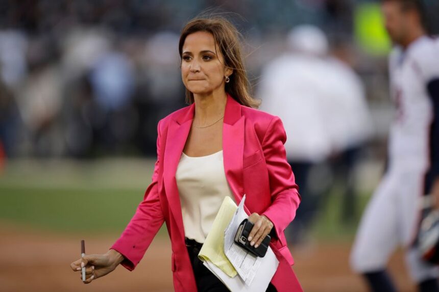 FILE- Reporter Dianna Russini works on the sidelines before the start of an NFL football game between the Oakland Raiders and the Denver Broncos Monday, Sept. 9, 2019, in Oakland, Calif. (AP Photo/Ben Margot, File)