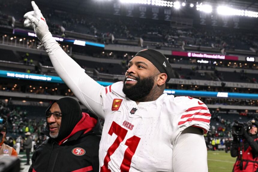 FILE - San Francisco 49ers offensive tackle Trent Williams (71) celebrates as he walks off the field after an NFL wild card playoff football game against the Philadelphia Eagles, Jan. 11, 2026, in Philadelphia. (AP Photo/Terrance Williams, File)