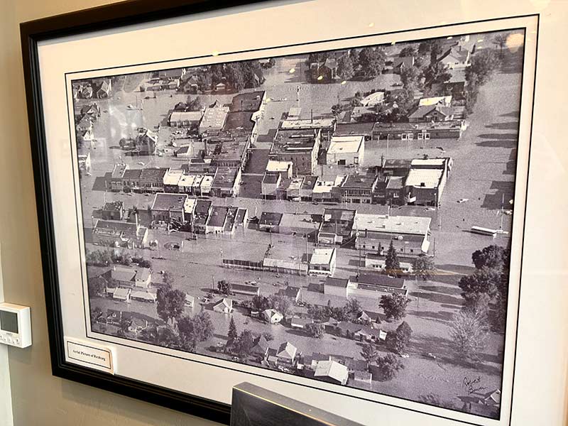 Photo inside the Romance Theatre showing an aerial view of Rexburg following the Teton Dam flood. | Rett Nelson, EastIdahoNews.com