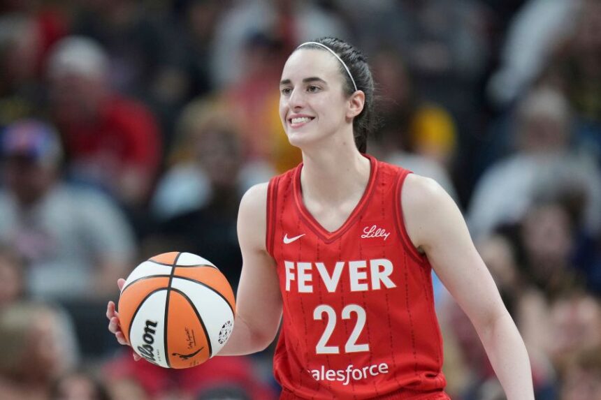 FILE - Indiana Fever guard Caitlin Clark (22) in action during a WNBA basketball game against the Chicago Sky in Indianapolis, May 17, 2025. (AP Photo/AJ Mast, File)