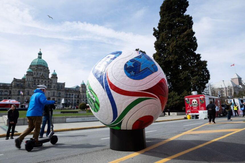 Soccer fans gathered on the grounds of the legislature to take part in the FIFA World Cup 2026 countdown celebration event in Victoria, B.C., on Tuesday, March 31, 2026. (Chad Hipolito/The Canadian Press via AP)