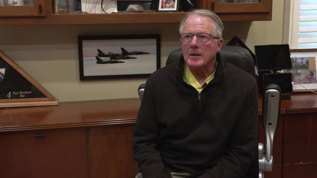 Paul Strickland, a retired Air Force pilot, in Layton on Monday, talks about a video of two planes colliding during an air show Sunday at Mountain Home Air Force Base in Idaho. (Photo: Shelby Lofton, KSL)
