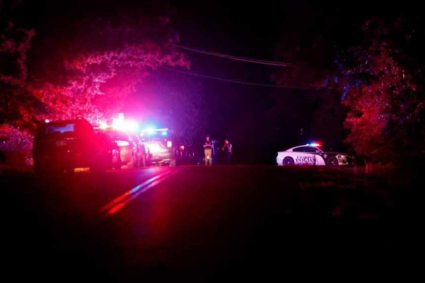 Police block off near S. Air Depot boulevard in Edmond, Okla., after a campground shooting at Lake Arcadia, Sunday, May 3, 2026.