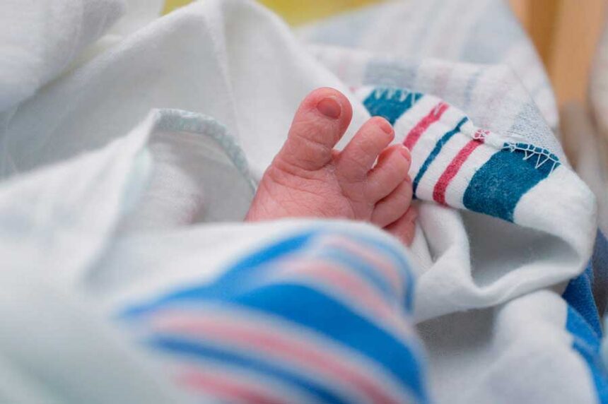 FILE - The toes of a baby are seen DHR Health, July 29, 2020, in McAllen, Texas.