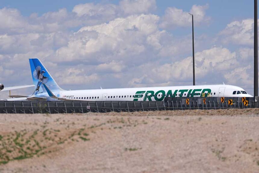 Frontier Airlines jetliner number n646fr sits outside the airlines technical operations center with other jetliners in for service north of Denver International Airport Saturday, May 9, 2026, in Denver.