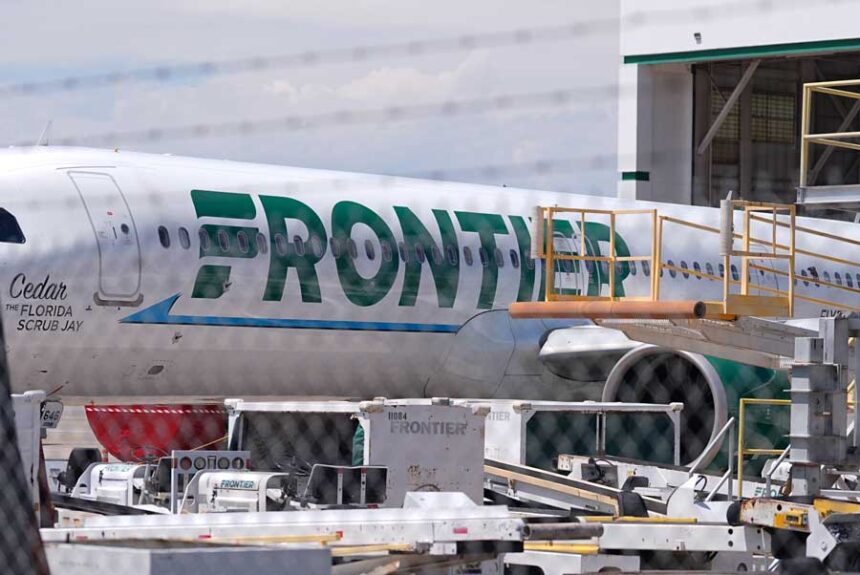 Frontier Airlines jetliner number n646fr sits outside the airlines technical operations center with other jetliners in for service north of Denver International Airport Saturday, May 9, 2026, in Denver.