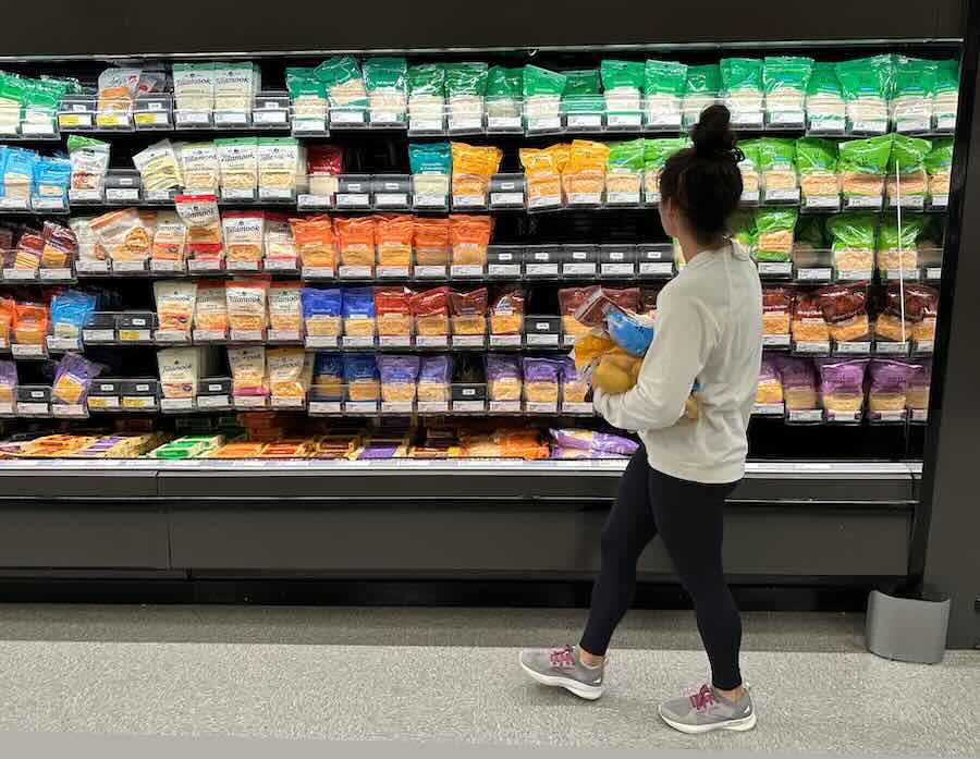 A shopper peruses cheese offerings at a Target store Wednesday, Oct. 4, 2023, in Sheridan, Colo.