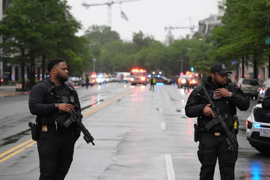 Police and members of the Secret Service block streets around the White House, Saturday, May 23, 2026, in Washington.