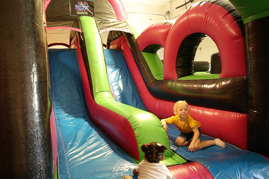 Kids play on an inflatable obstacle course in Bounce City on Saturday. | Cody Roberts, EastIdahoNews.com
