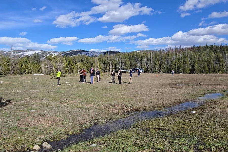 Volunteers assist in the search and rescue efforts for a man trapped under logs on Marsh Creek on Tuesday night. | Custer County Sheriff's Office