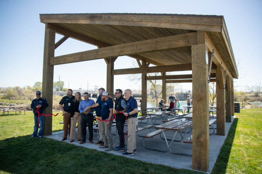 Dignitaries cut a ribbon at a new shelter in Heritage Park on Wednesday. | Cody Roberts, EastIdahoNews.com